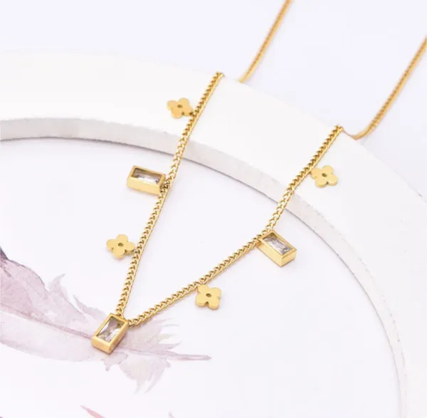 Dainty Clovers & CZ Charms Gold Necklace - Image 7