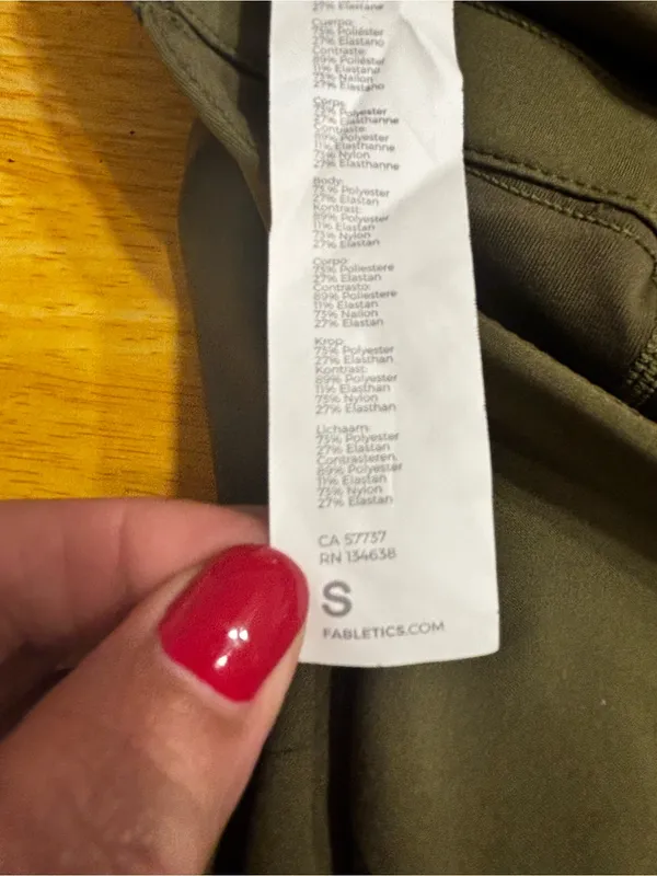 Fabletics Motion 365 onesie in olive green features a racerback design - Image 11