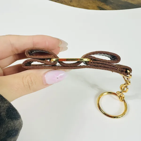 Salvatore Ferragamo Vara Bow Keychain Womens One Size Brown Gold Logo Italy - Image 5