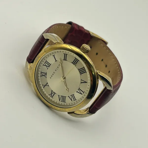 Anne Klein Gold Tone Red Genuine Leather Roman Numerals Markers Women’s Watch - Image 4