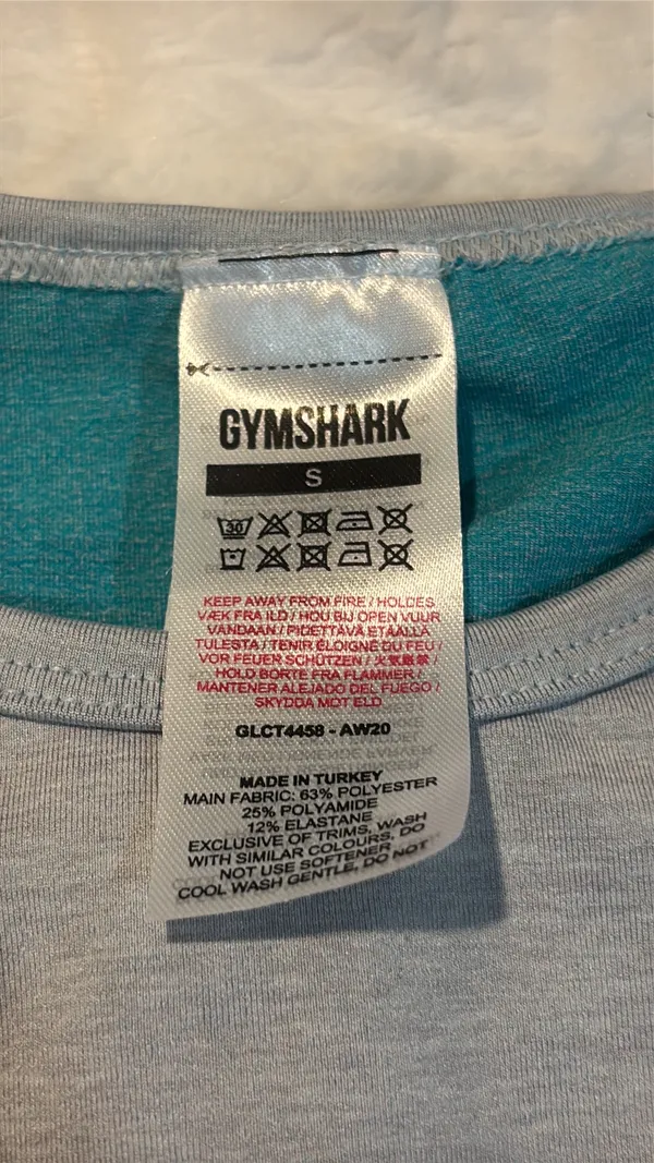 Gymshark Women's Teal and Gray Long Sleeve Crop Top Size Small . Stylish long sleeve crop top by Gymshark. Features a sleek teal and gray design. Perfect for workouts.. NWT - Image 4
