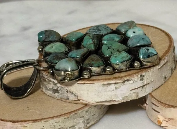 Turquoise cluster pendant set in Tibetan Silver. 14 nuggets, 2”x2” - Image 2