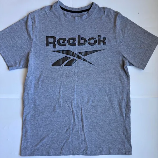 Boys Reebok Tee ✦ Open To All Offers ✦ Bundle Measurements: Used Excellent Condition. Tag Flaw Boys Classic Reebok Gray Casual Tee Short Sleeve XL Tight Athletic Fit. Excellent For Casual & Active Wear. Classic Reebok Front Side. Light Durable Fabrics. Gray / Black ——— TAGS ——— #Compression #Reebok #Athletic #Nike #Casual - Image 2