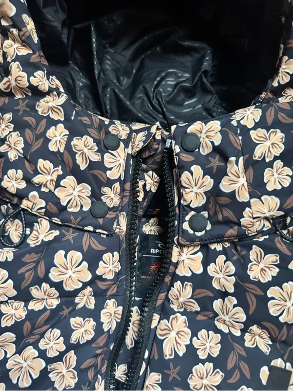 Rip Curl Black Puffer Jacket with Cream Floral Print - Image 9
