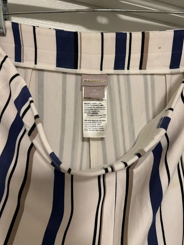 CHICO’S Stylish wide-leg pants in a navy and white striped pattern. Lightweight, flowy fabric for all-day comfort. Versatile design that dresses up or down. Easy to pair with tops and sandals. - Image 7