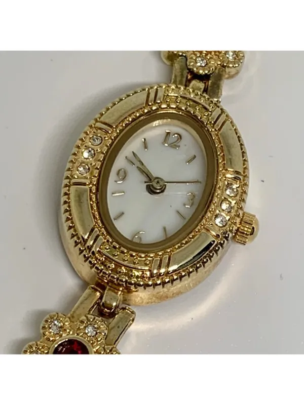 Allude gold tone women’s watch red stones 19mm floral links up to 7.5” running - Image 3