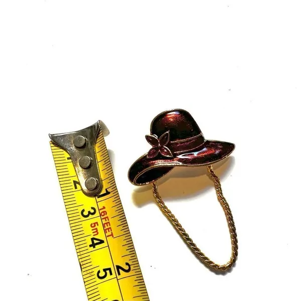 Red enamel hat brooch with gold tone chain - Image 5