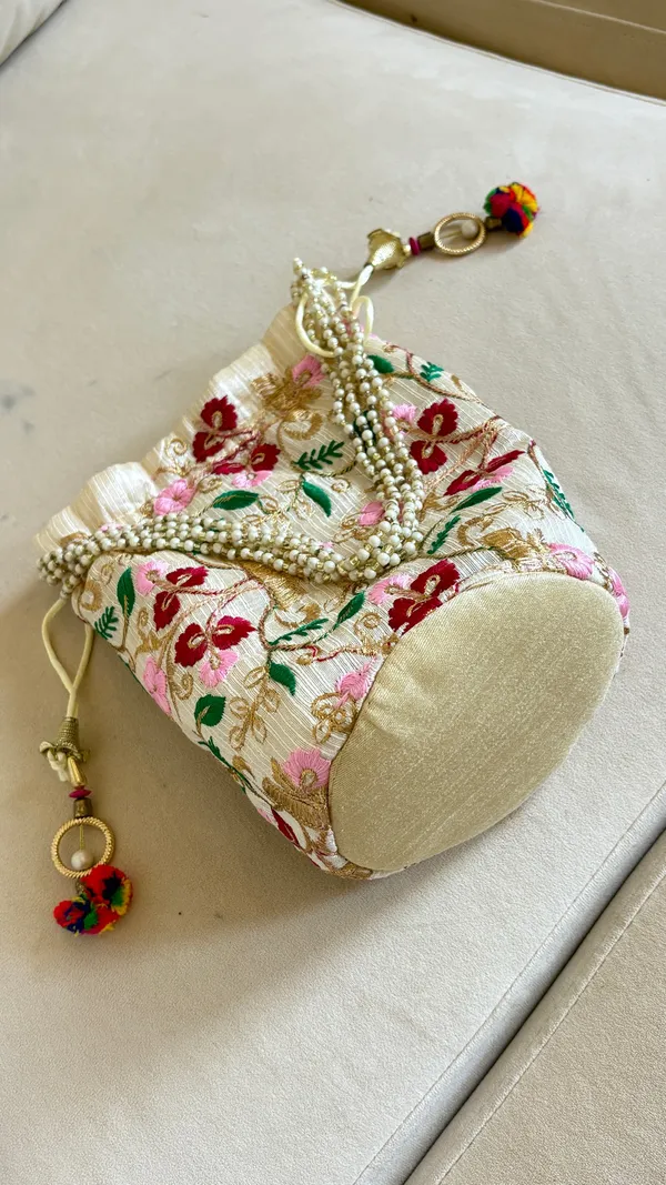 Handmade embroidered floral drawstring bag with pink, red, and green flowers and gold accents. #handmade #embroidered - Image 4