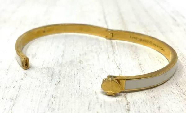 Kate Spade gold tone and white enamel hinged bangle bracelet - Image 9