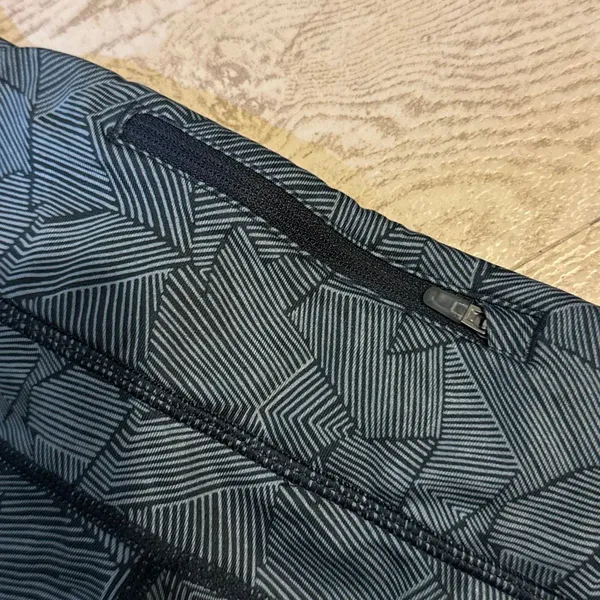 Nike Dri-FIT Capri running leggings with a black and gray geometric print and me - Image 9