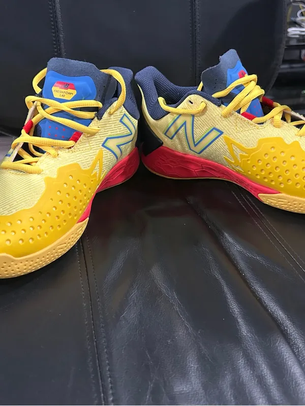 New Balance Fresh Foam X Lav V2 in the "Egg Yolk/True Red" colorway - Image 2