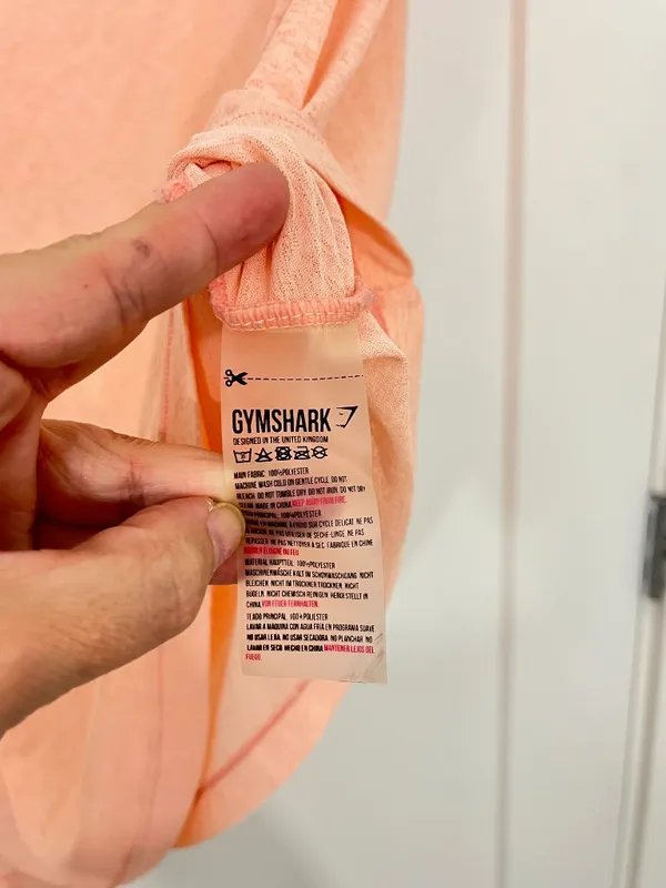 Gymshark x Nikki Blackketter Medium Peach Asymmetrical Hem Athleisure Top - Image 4