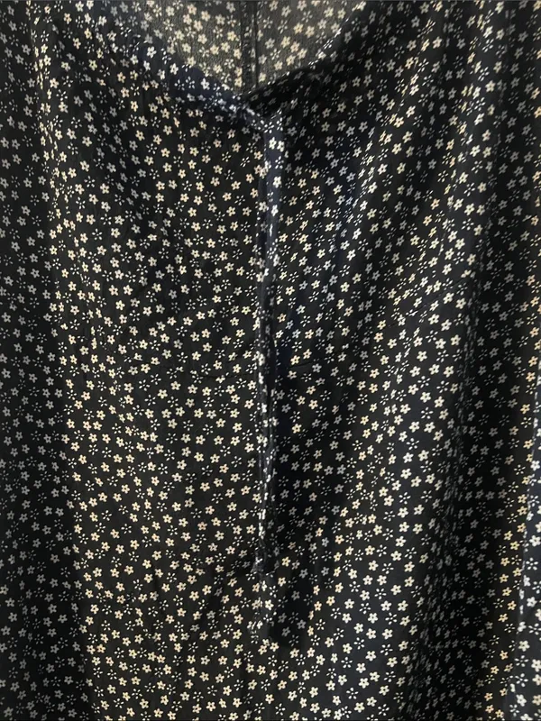 Brandy Melville Black Mini Slip Dress with White Daisy Print - Image 2