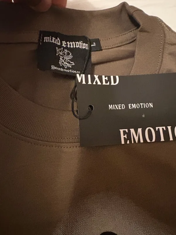 Brown Emotion graphic tee with blindfolded angel with wings and the word 'Emotion' in a red glittery script, Size M - Image 5