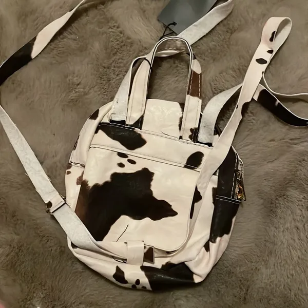 MOVING SALE!! NWT Cow print mini backpack! - Image 2