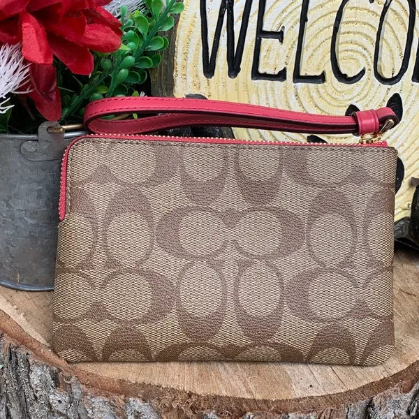 Authentic COACH Signature coated canvas/leather heart( good times) zip wristlet - Image 3