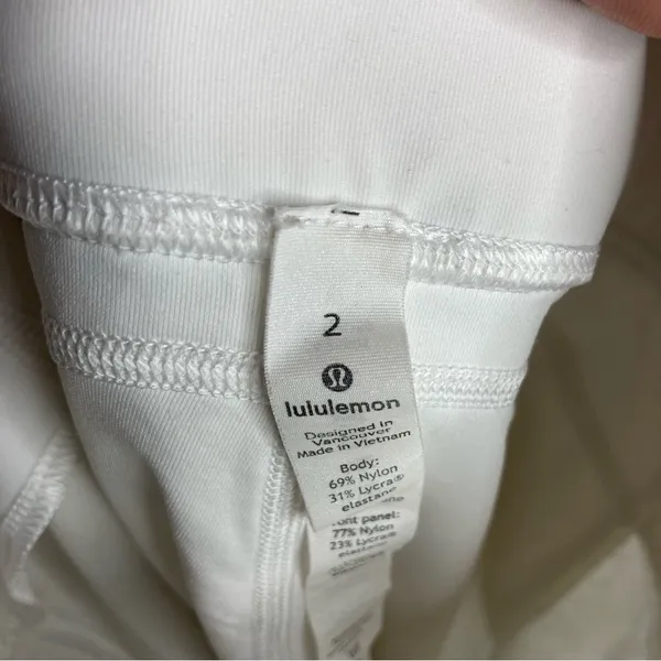 Lululemon white cropped leggings with mesh sides‎ size 2 - Image 9