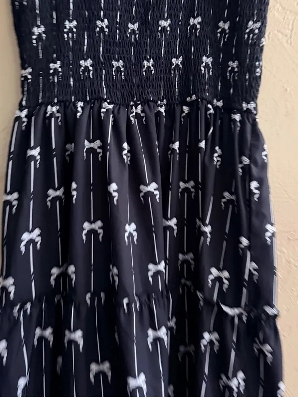 Ecowish Wish Black and White Smocked Dress with Bow Accent - Image 3