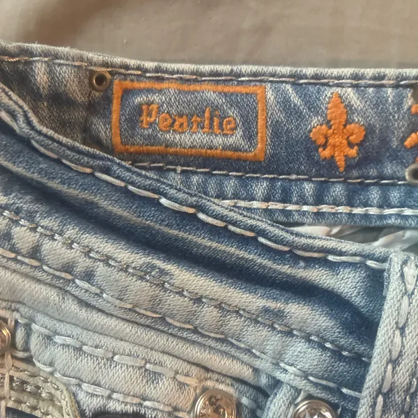 Rockin rival, distressed, and embroidered jeans - Image 7