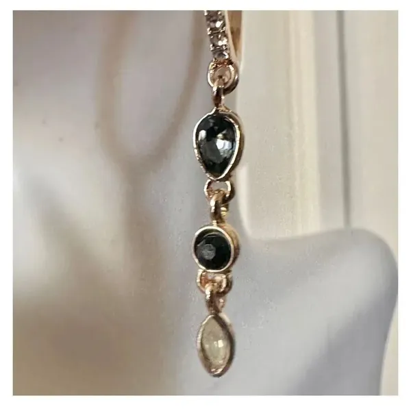Gold tone hoop earrings with dangling rhinestones - Image 8
