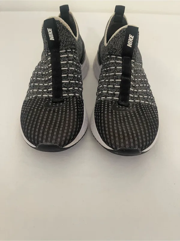 Nike Women’s Black and White Slip-On Knit Sneakers - Image 2