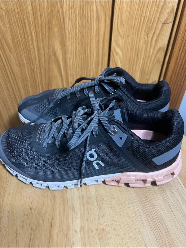 On Running Black Athletic Shoes with Pink Accents - Image 4