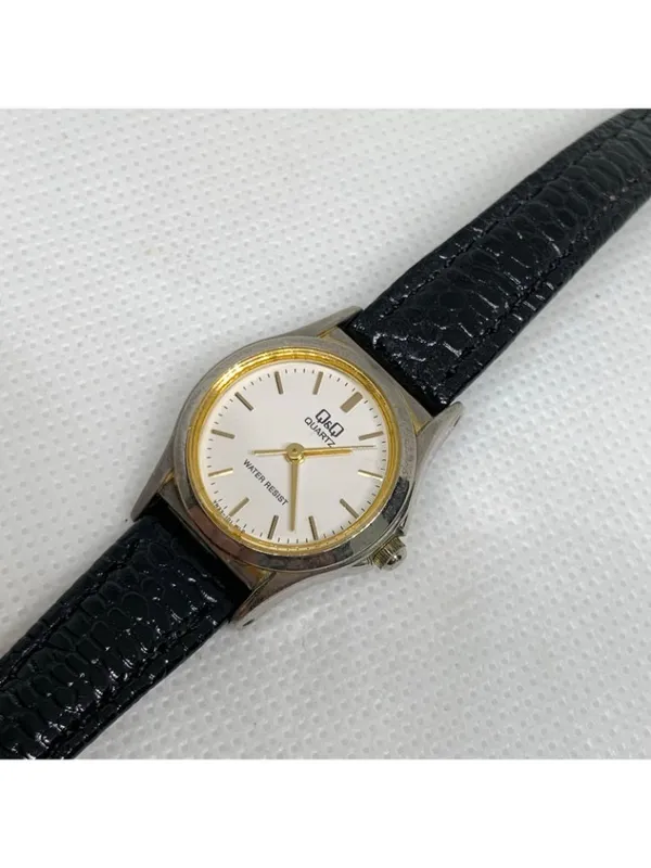 Vintage Q&Q women’s watch 22mm gold tone black leather band up to 7” running - Image 2