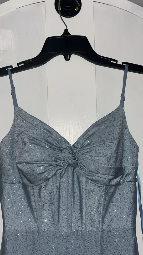 Stacees dusty blue, glittery, mid-length dress, with corset rib design, and knot design on chest, with bra padding built in. - Image 5
