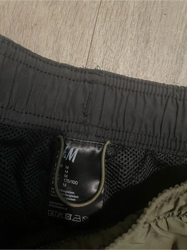 H&M Olive Green Athletic Shorts with White Trim - Image 2