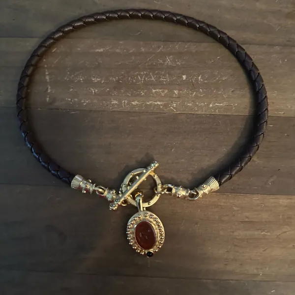 Brown leather braid toggle necklace with carved Roman head pendant - Image 2