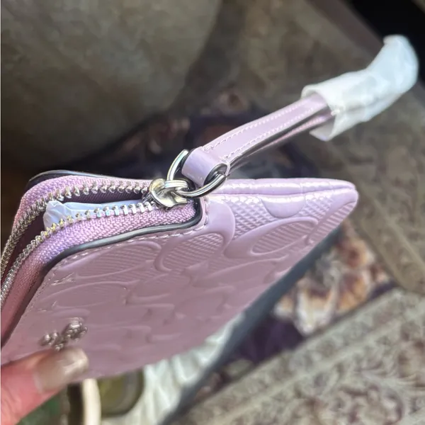 Authentic COACH patent signature leather zip top wristlet with a heart charm - Image 7