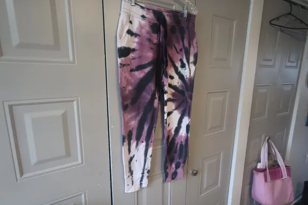 PINK Victoria's Secret tie dye sweatpant joggers outline pink on left leg in purple, black and pink size XS. - Image 3