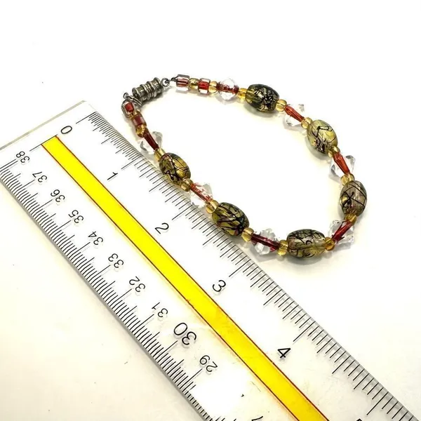Clear and yellow beaded bracelet - Image 7