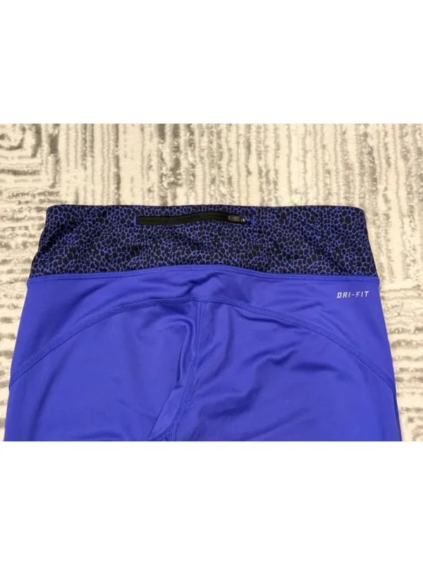 Nike women's small purple/black Dri-Fit capri leggings - Image 8