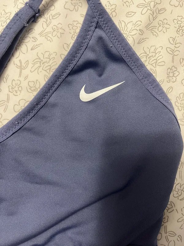 Nike Dri-FIT Indy Women's Light-Support Padded V-Neck Sports Bra in a blue/purple color - Image 2