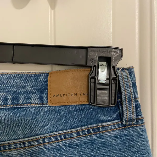 EUC American Eagle women’s medium‎ wash distressed hem short jeans size 4 - Image 5