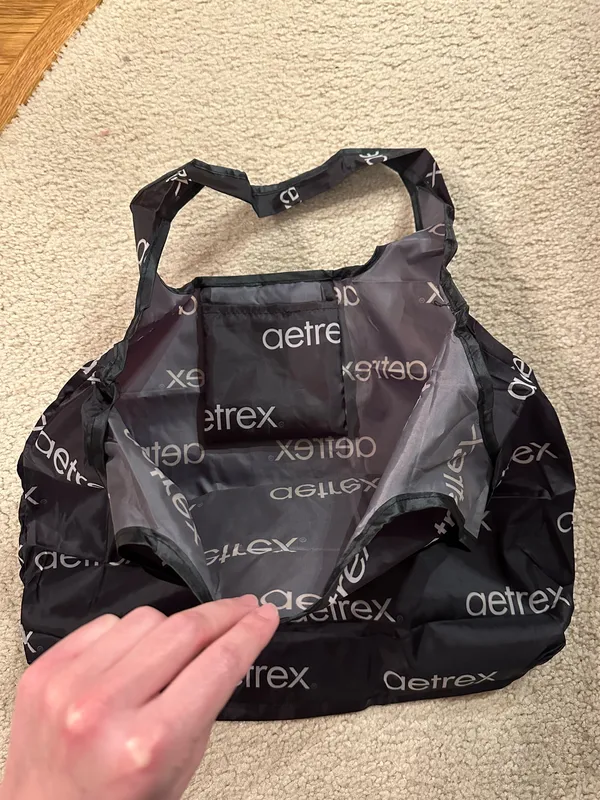 Black Aetrex tote bag/grocery bag. Folds into itself/portable. New without tags - Image 4