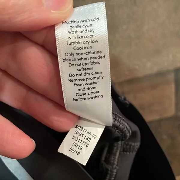 Athleta Ace Black Tennis Skort with silver reflective stripe on waistband - Image 10