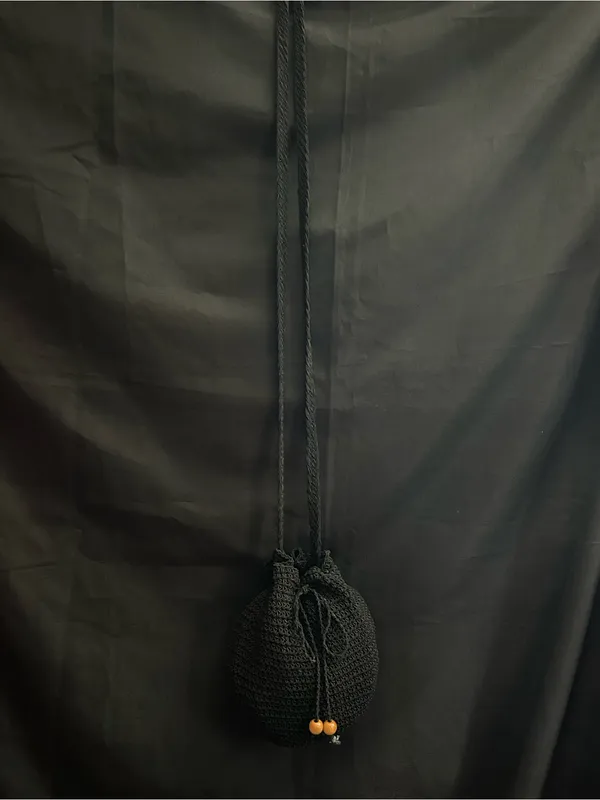 Black Crochet Drawstring Crossbody Bag - Image 2