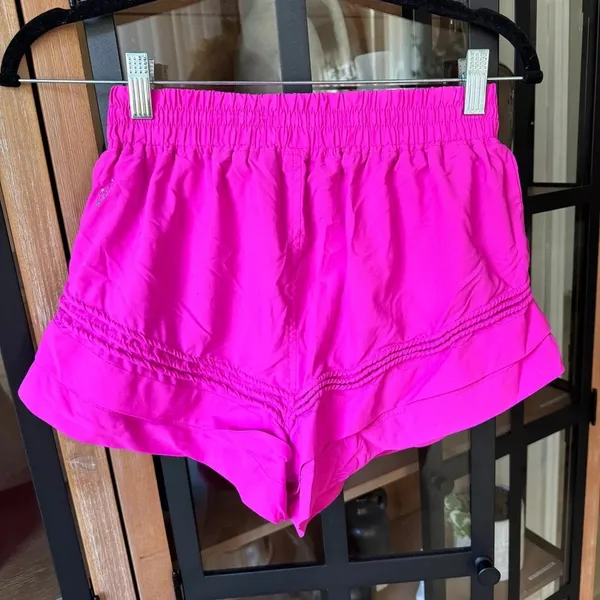 FP Movement Check It Out shorts neon barbie pink workout running pockets - Image 4