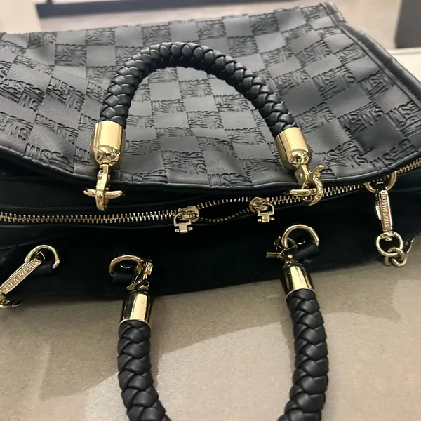 Steve Madden Elegant Black Handbag with Gold Accents Some usage-clean! - Image 3