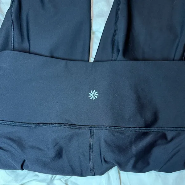 Athleta leggings, size S, black, with pocket and logo detail - Image 5