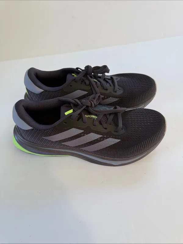 adidas women’s Black Athletic Shoes with White Stripes and Neon Green Accent - Image 4