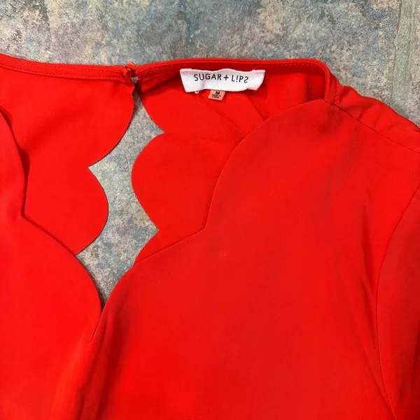 sugar + lips salmon colored scalloped romper with open back cutout - Image 2