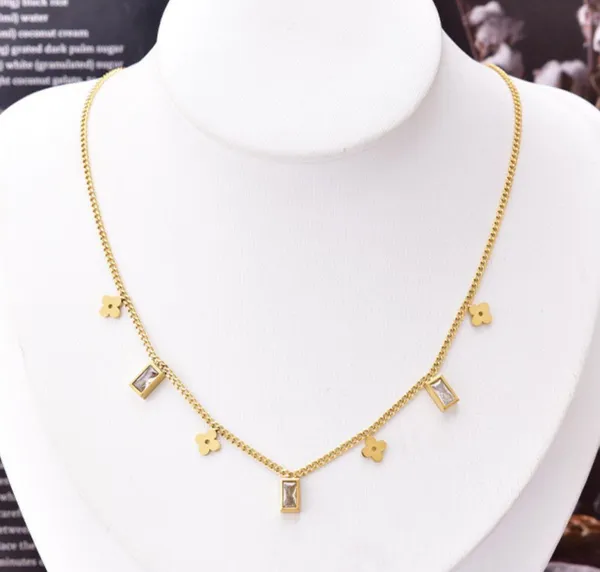 Dainty Clovers & CZ Charms Gold Necklace - Image 8