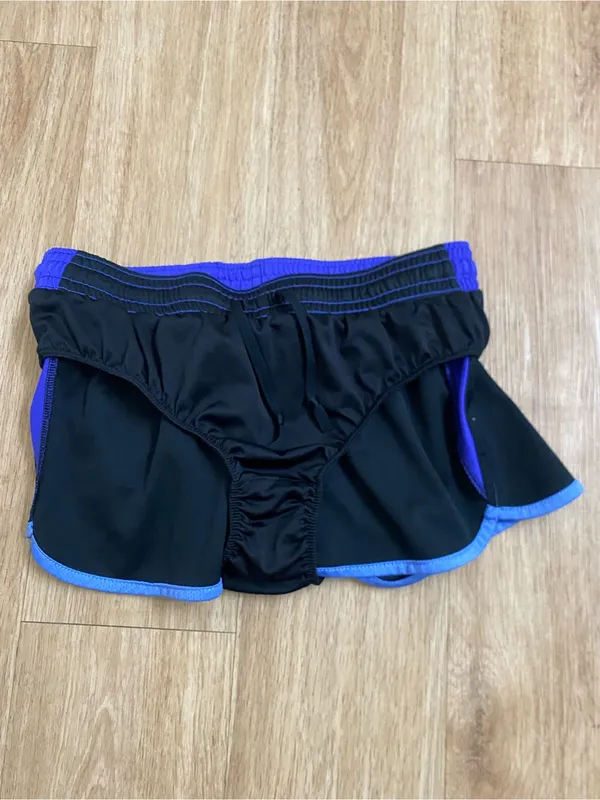 Nike Women’s Black Shorts with Purple Trim - Image 3