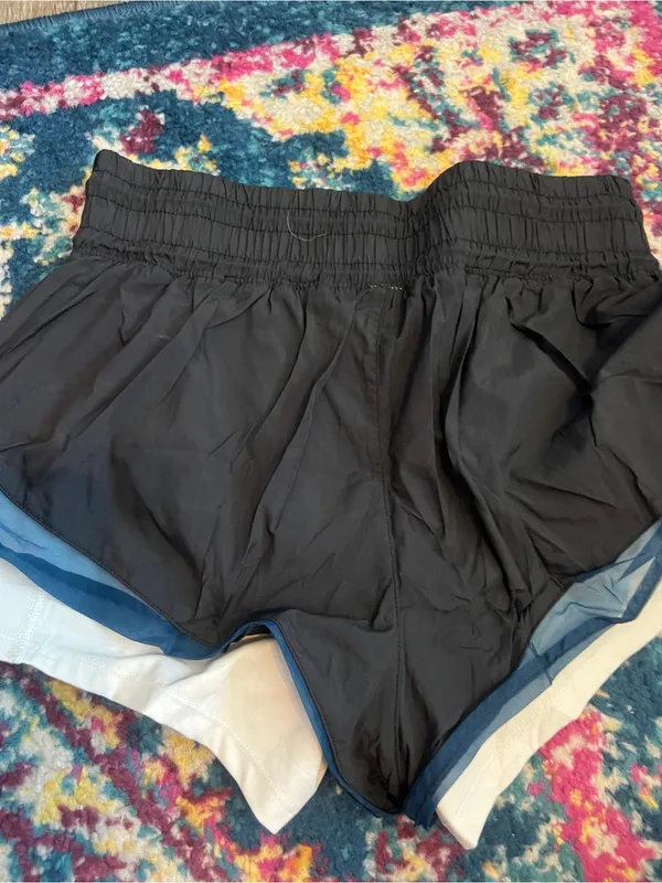 Free people movement Women’s Black Layered Athletic Shorts with Blue Trim - Image 7