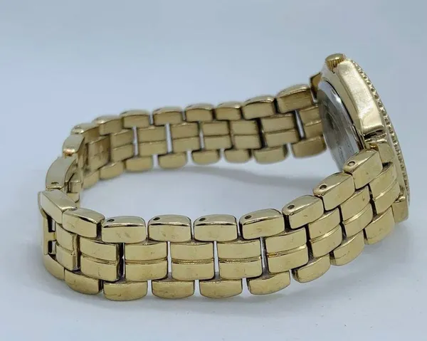 Armitron 27mm ladies Quartz analog WR watch gold tone MOP dial 6.5”-7” - Image 5