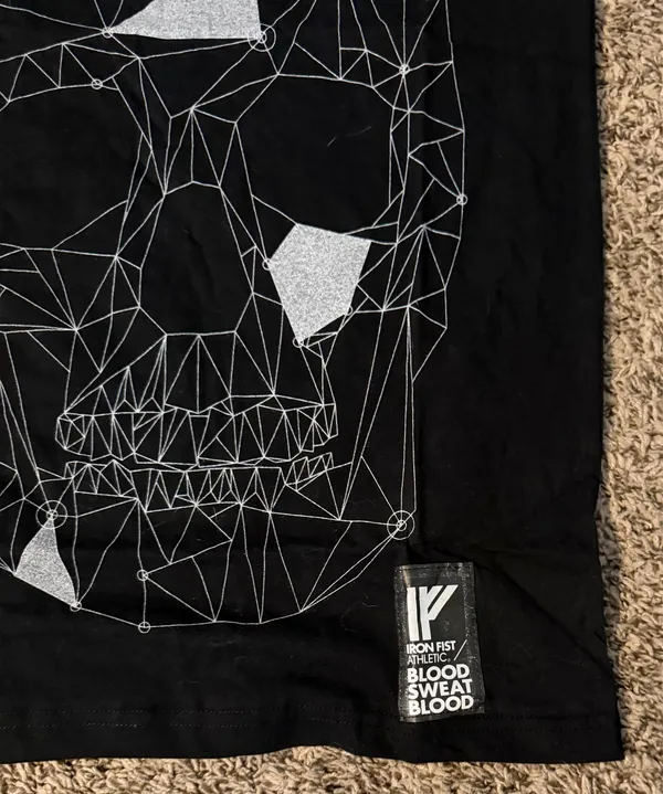 Iron Fist Black short‑sleeve tee featuring a large geometric skull graphic in silver. Modern, edgy design. Great for alternative and streetwear looks. - Image 2