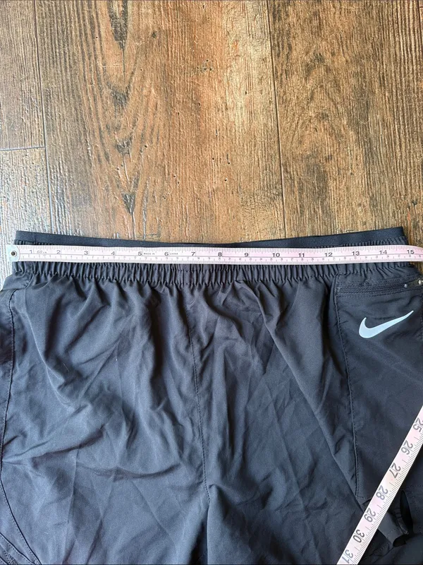 Nike Women’s Black Athletic Running Shorts with White Swoosh - Image 6